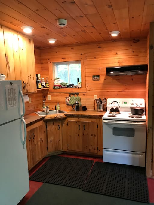 Fully stocked kitchen with all the correct spices and cookware.