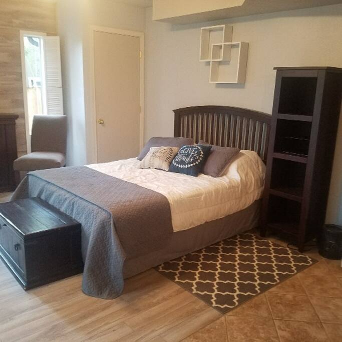 Bed & one of two closets