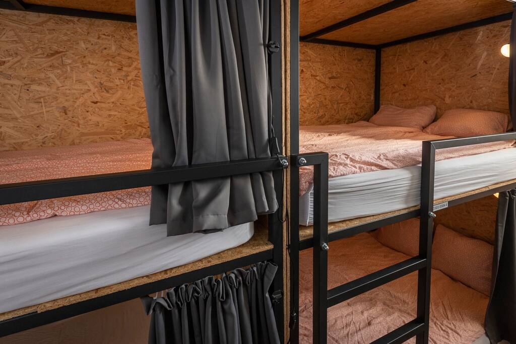 Our double bunk beds are perfect for families, friends, and couples who want to share a bed while traveling on a budget.