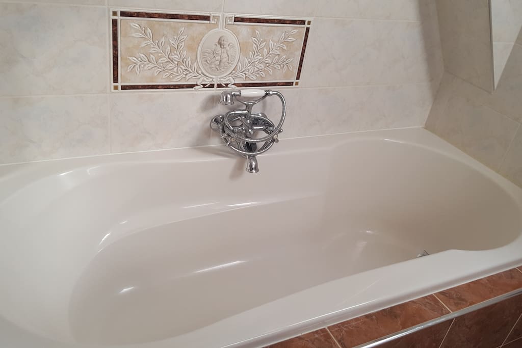 Bath tub, big enough for 2 large persons