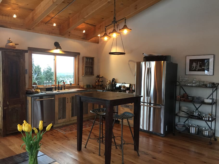 Stainless steel, galvanized metal counter tops and custom barn wood cabinets.