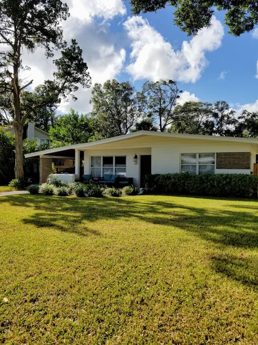 Front of the house with front patio and side deck