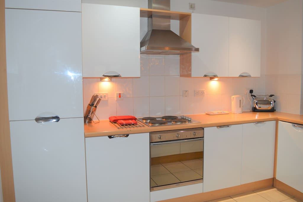 Kitchen - fully equipped with pots, pans, plates and cups