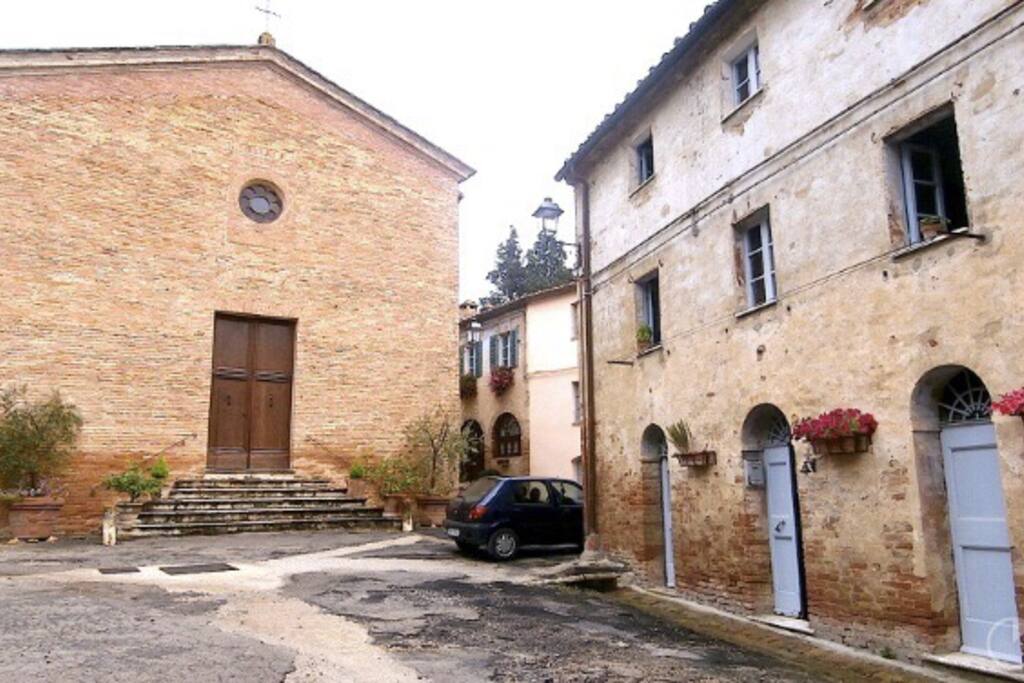 House from outside and Church
