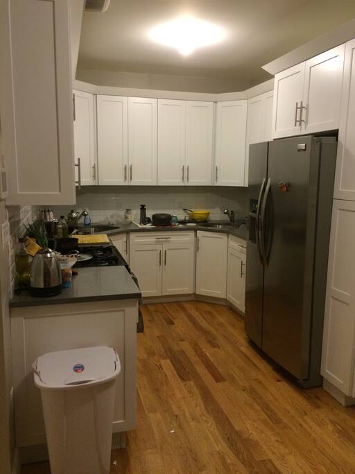 Kitchen with plenty of refrigerator and cabinet space, plus a dishwasher.