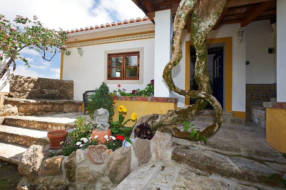 A stone cottage in a terraced garden in Sintra, Sintra, Lisbon District, Portugal, photo 4 of 10