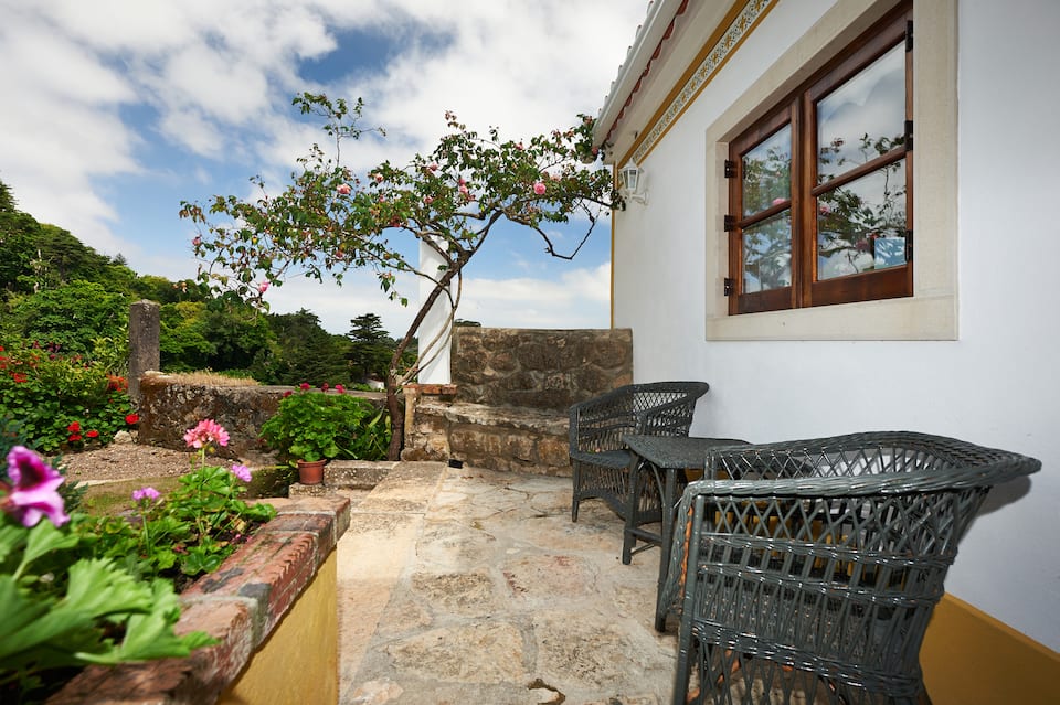 A stone cottage in a terraced garden in Sintra, Sintra, Lisbon District, Portugal, photo 7 of 10