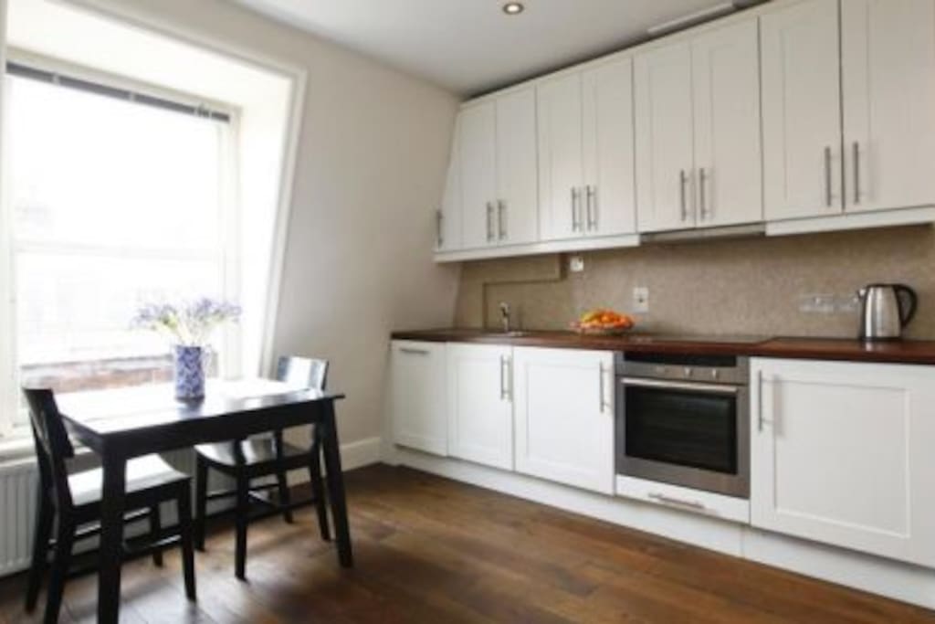 Fully equipped kitchen.We also have a microwave and toaster, not shown. Fridge, Washing Machine, Dishwasher behind doors!