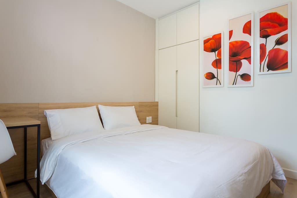 Your room with natural light, queen size bed, working desk, wardrobe, private fridge, private bathroom , clean beddings and towels