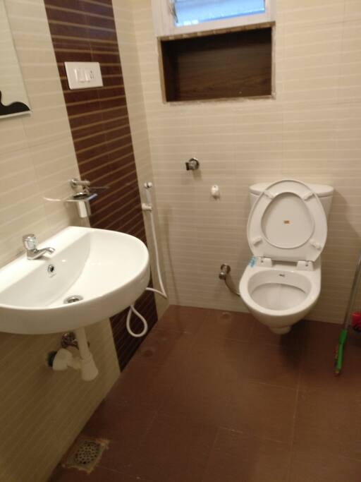 Clean toilets with an attached shower space because hygiene comes first!