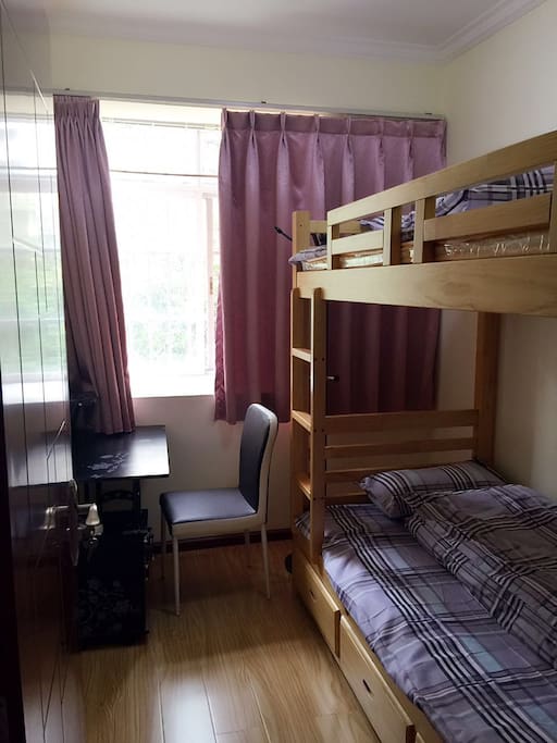 a separate room with a double-deck bed
