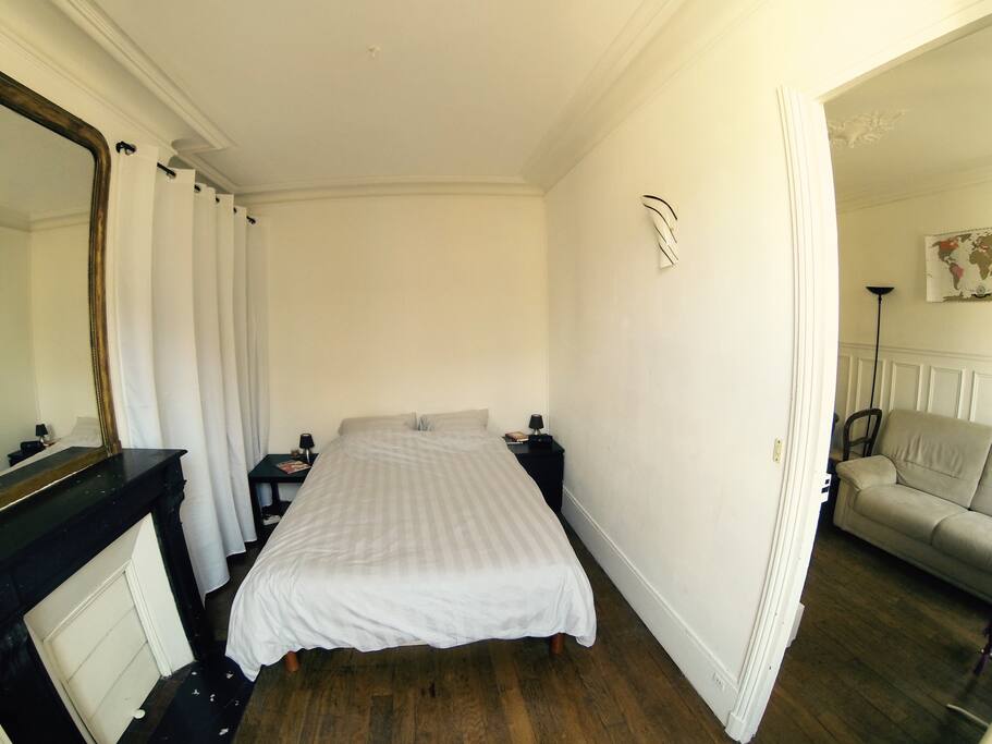 Master bedroom with double bed, entrance from the living room