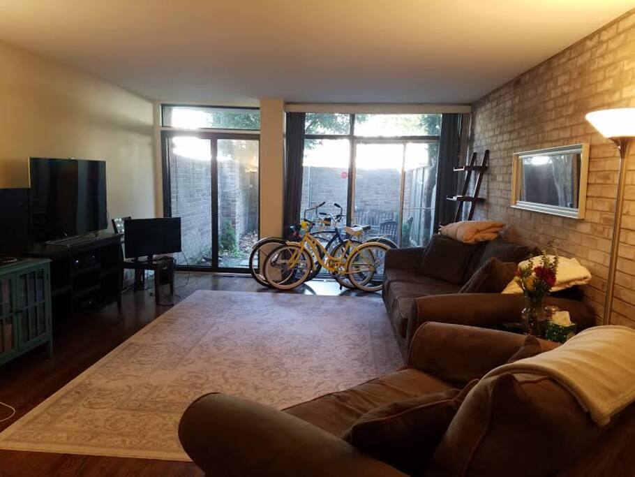 Living room with small backyard and firepit