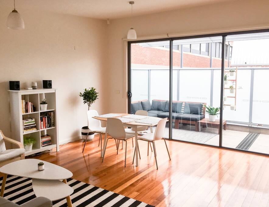 Open plan living room and private balcony