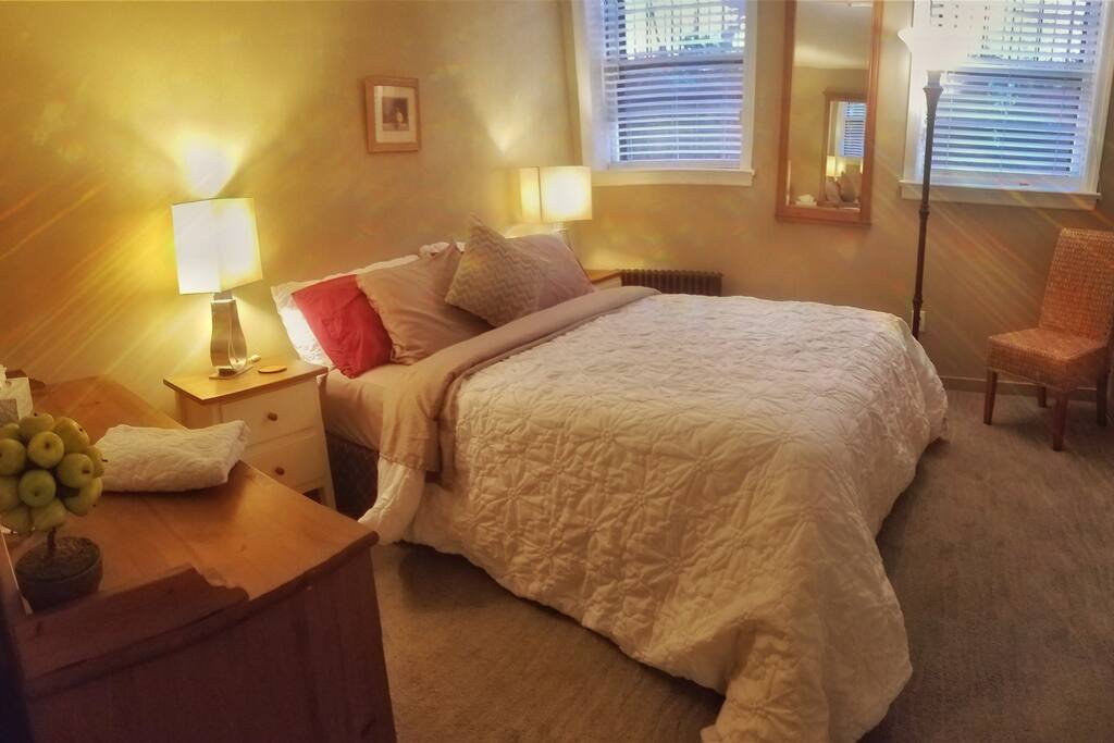 Fully outfitted bedroom with two full-size windows.