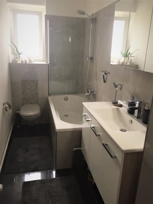 Freshly renovated bathroom with bathtub