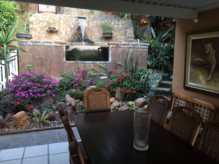 The outdoor verandah and fish pond area.
