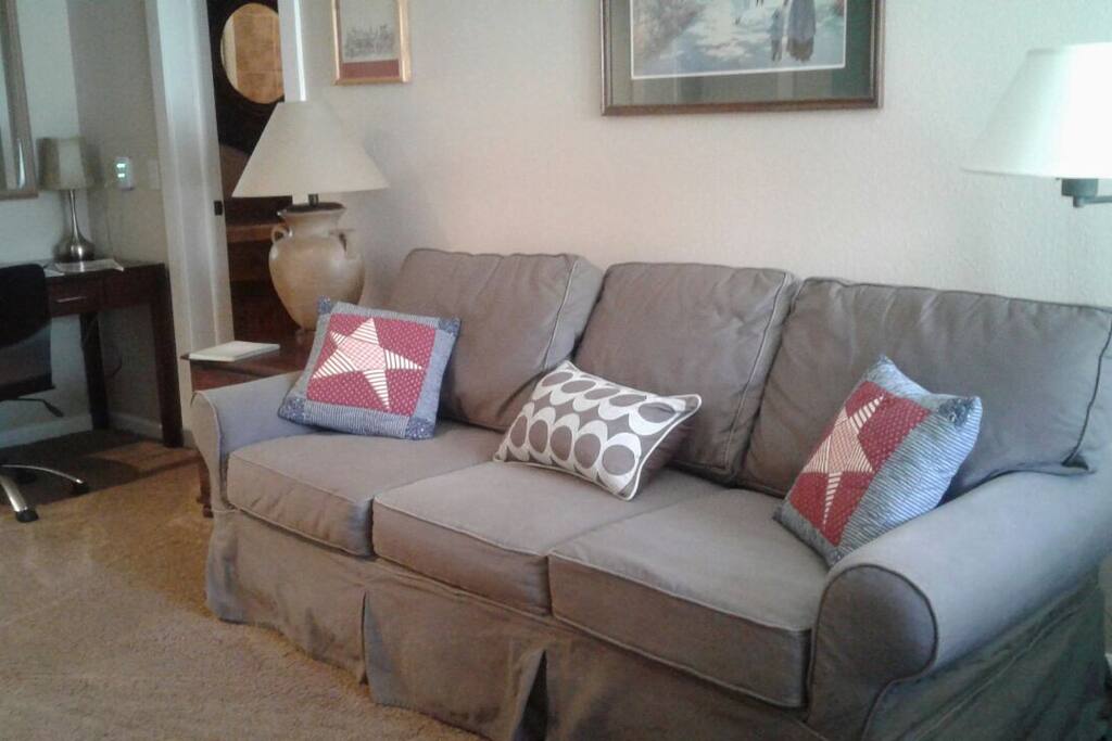 Queen size pull out sofa and work station with USB port and extra electric sockets to plug printer and/or laptop.