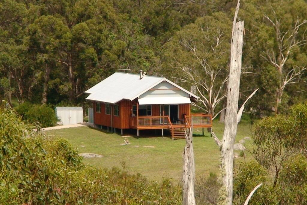 Nestled in 125 acres of mixed forest and open land.