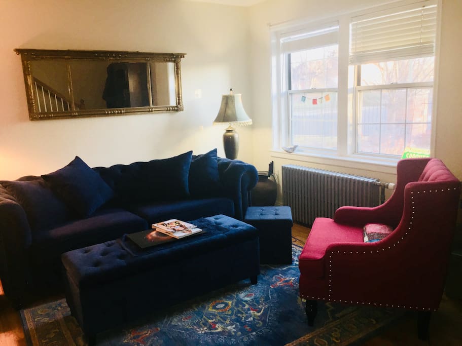 Comfortable living room with option of smart TV. Couch is very roomy and comfortable and can be used for additional bed. Extra bedding including pillows provided.