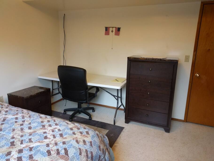 Table, chair, nightstand and free wifi; extra lamp available