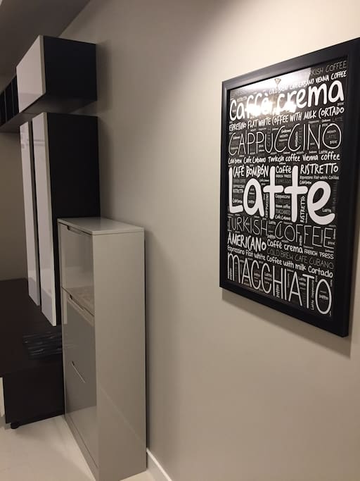 As you enter the unit, you'll find a shoe rack to organize your footwear