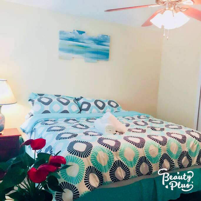 First room: Large, sunny, and lake view room.