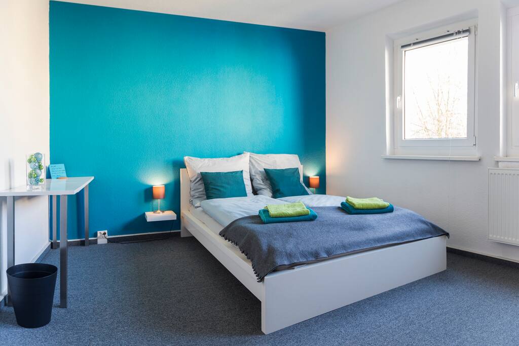 Your bedroom with a comfortable bed.