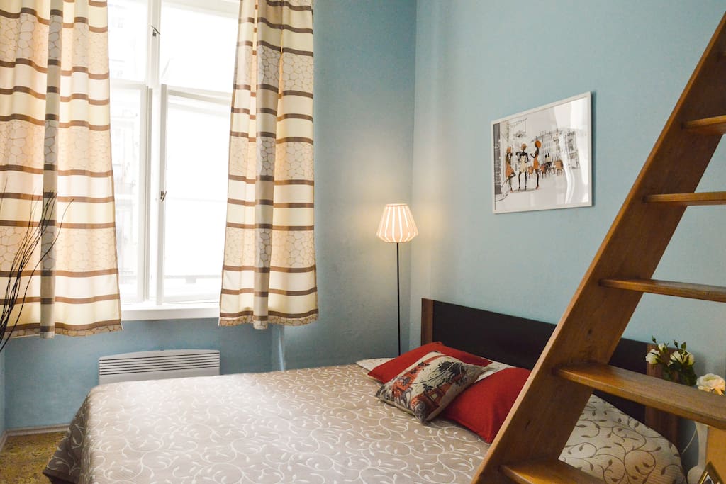 Bedroom with king-size bed for two person.