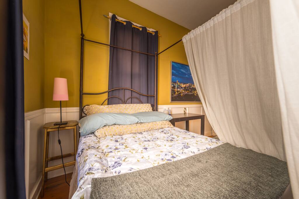 Bed D, double bed with curtains.