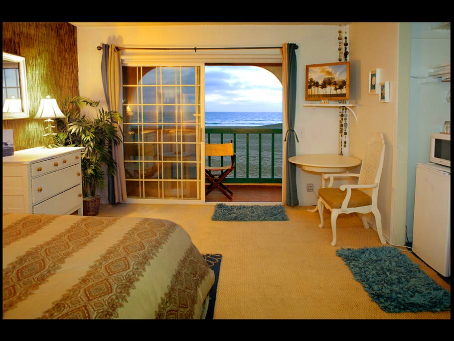Sunset and sunrise from your oceanfront bed!
