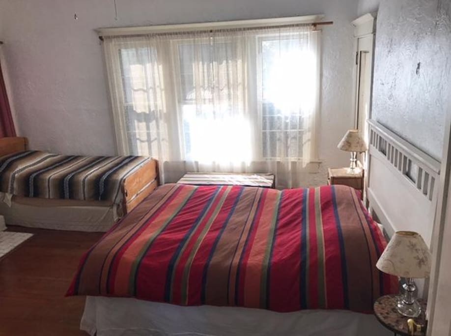 Queen-sized bed and single bed