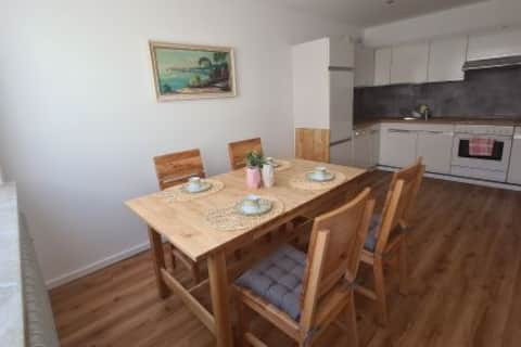 Lovingly furnished house with garden and yard.
