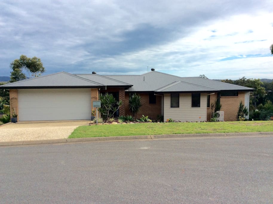 House from road. Bnb space is downstairs at the back. Just pull onto the grass verge and we will meet you at the front door.