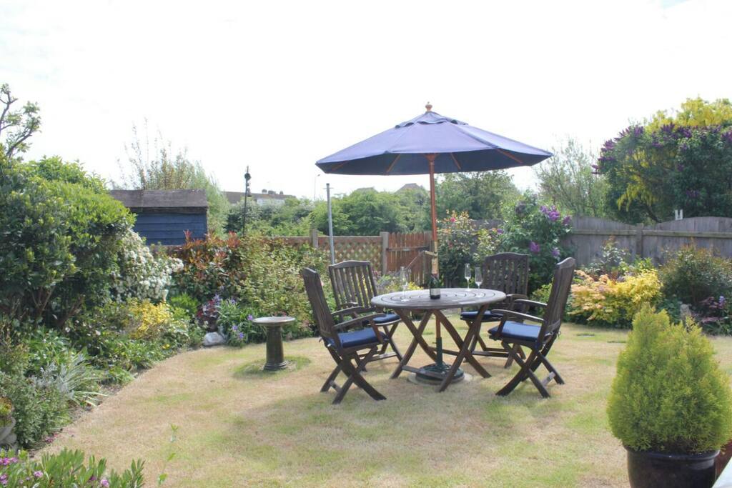 Enclosed garden overlooks a private lake. Sometimes cheeky ducks may come to the gate to say hello!