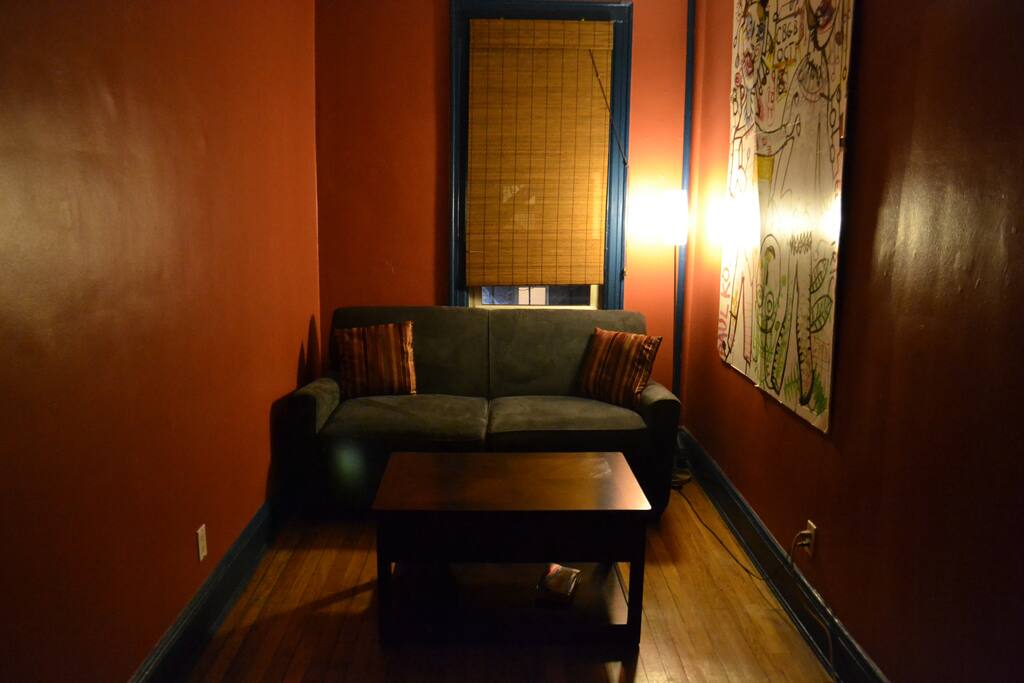 Pull out sofa bed with lift top coffee table/work station.