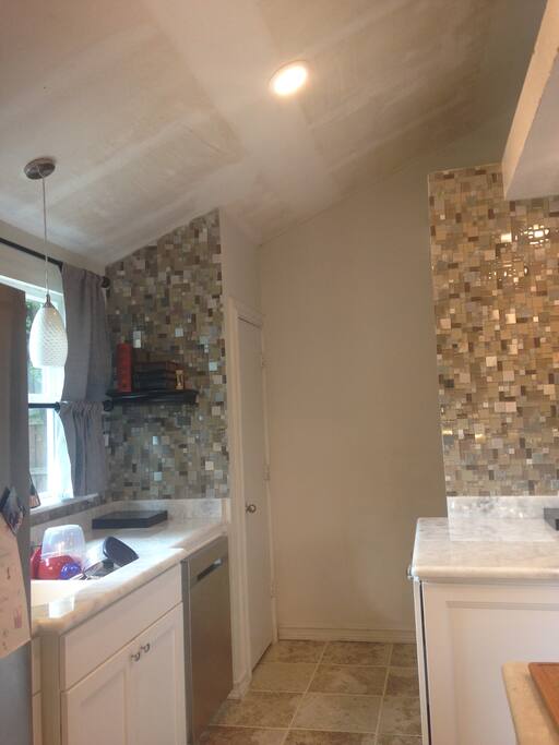 common Kitchen,microwave,french door fridge,stove and cookware