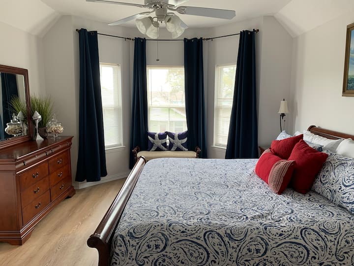 Upstairs Master Bedroom with a King size bed and has an on-site master bathroom
