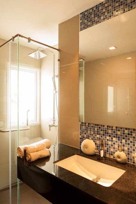 Toilet and rain shower with hot/cold water