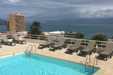 In a secured residence 50 meters from Monaco.