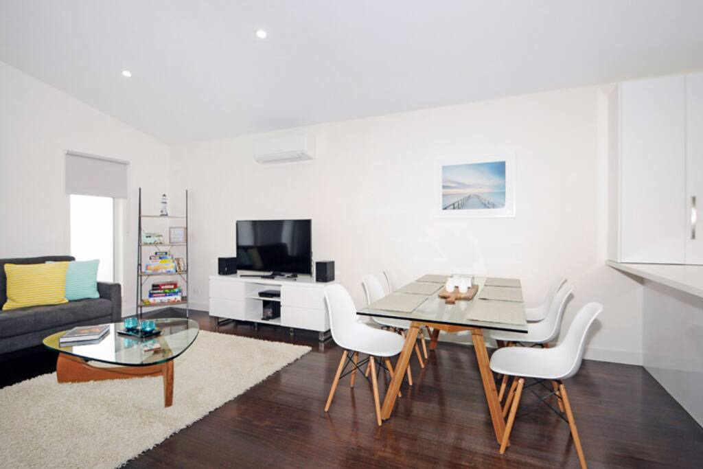Living and dining room. Lots of board games for you to use.