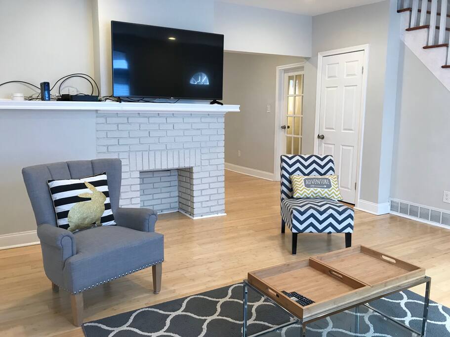 Living Room with 55 Inch TV + Half Bath