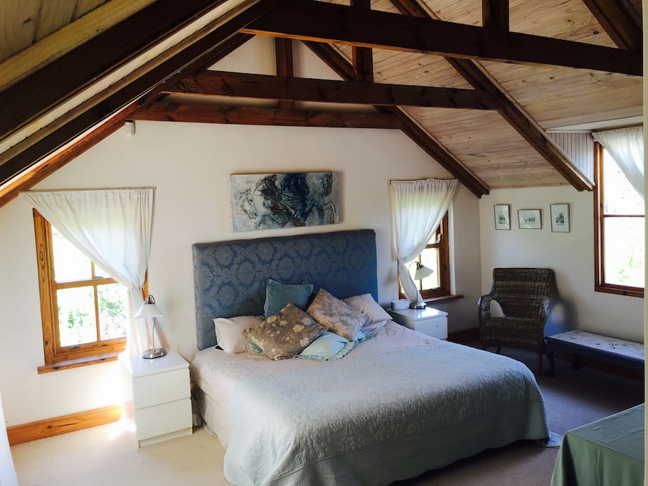 Very spacious main bedroom with king size bed.