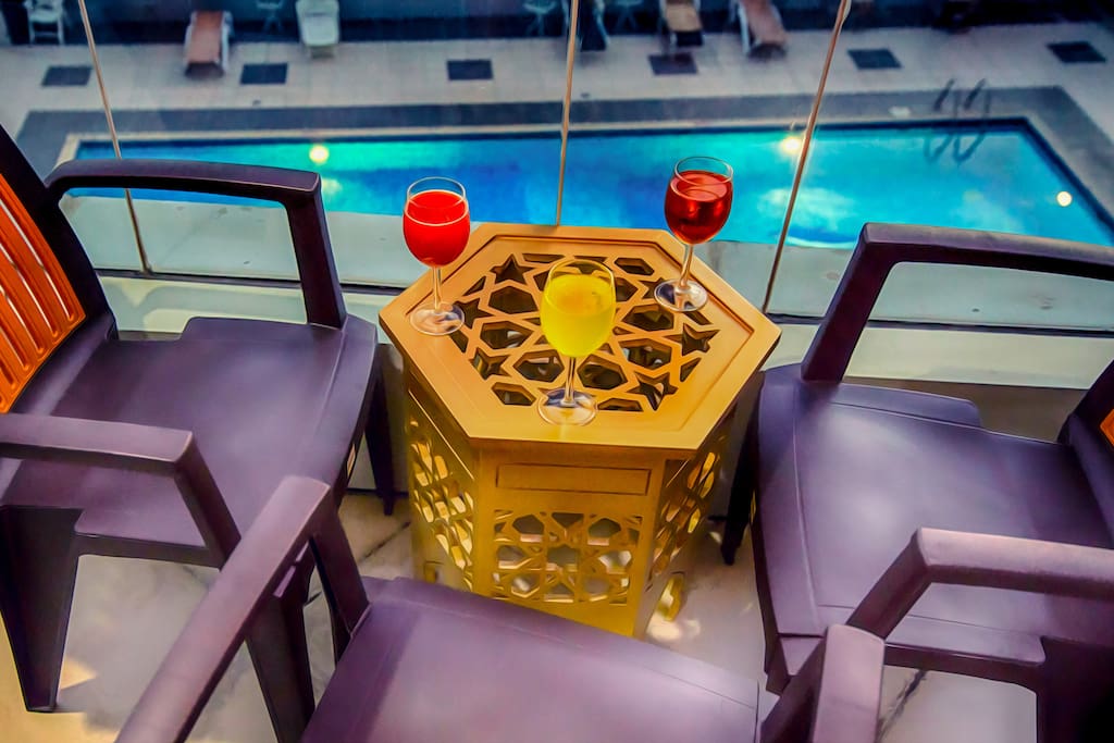The balcony is overlooking the pool. Free access to pool & gym!