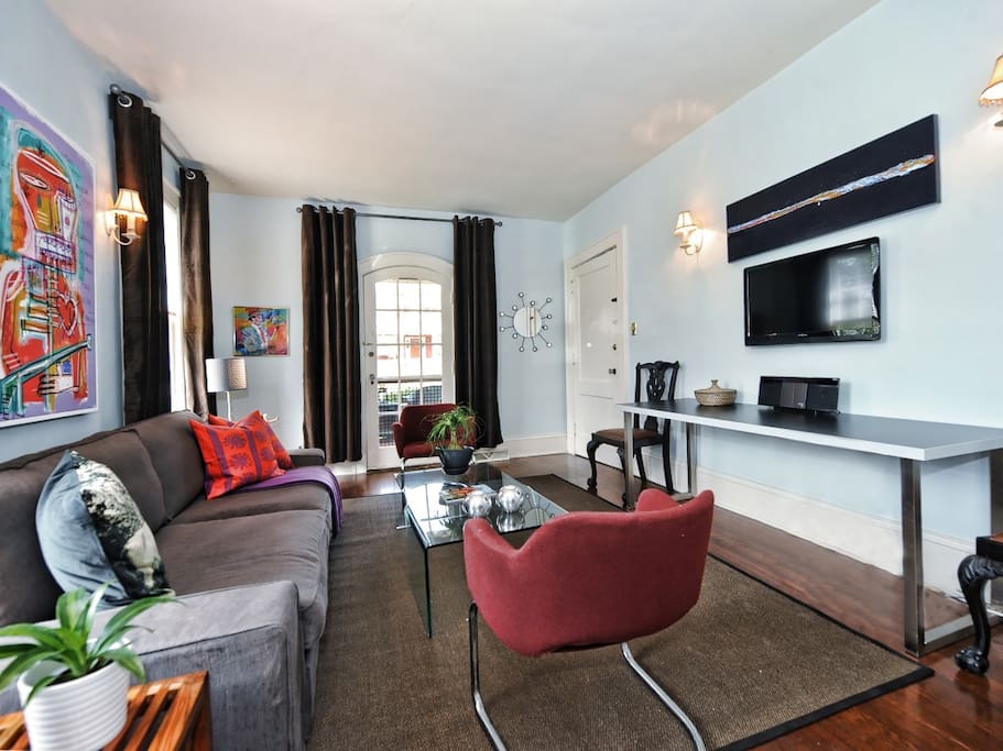Original artwork is on the walls throughout the apartment.