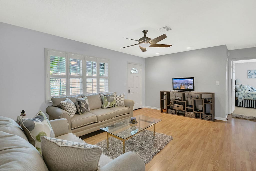 The living room offers comfortable seating for unwinding with a movie on the 32” flat screen TV with a Roku player.