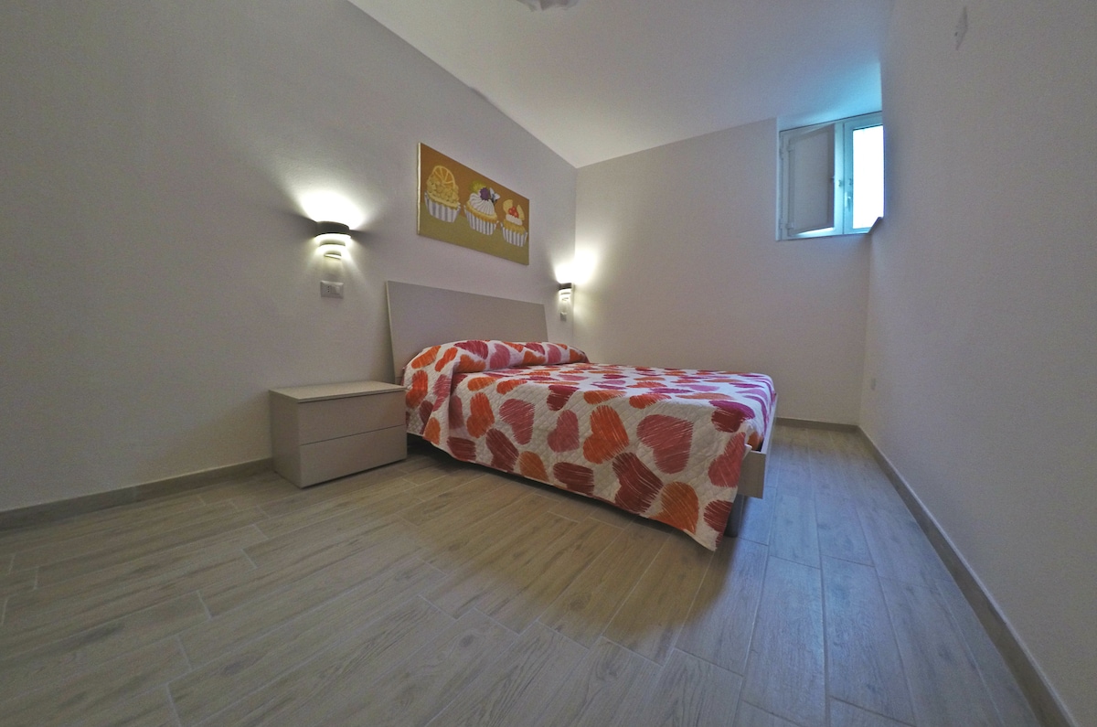 Spálňa s manželskou posteľou