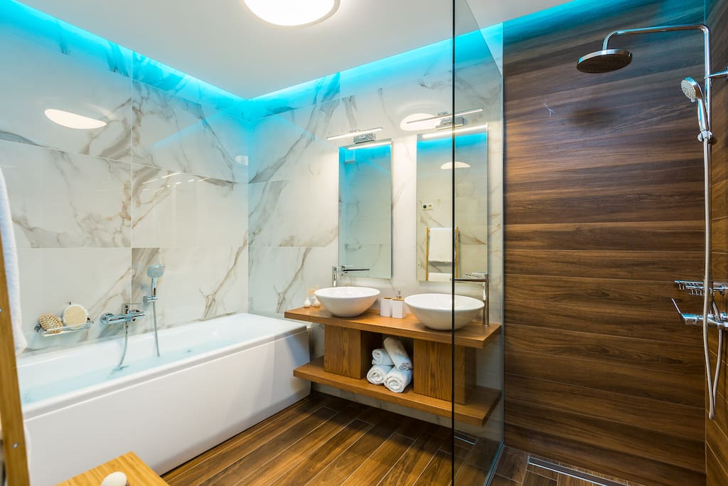 Master bathroom of the villa with hydromassage tub and shower