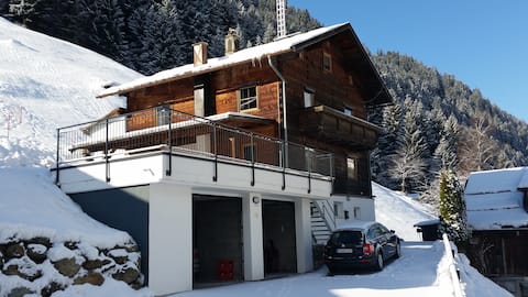 Haus Alpenglow hillside chalet with scenic views