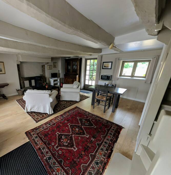 Living room and dining area with espresso machine and kettle at your disposal